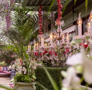 Stunning floral and lighting arrangement at romantic restaurant, The Garden Room