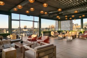Seating and views at the Glenn Hotel's rooftop bar