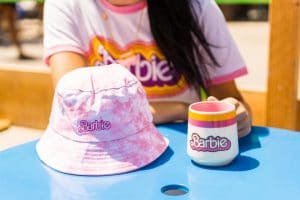 Merchandise available at the Barbie truck. Hat, mug, t-shirt and necklace.