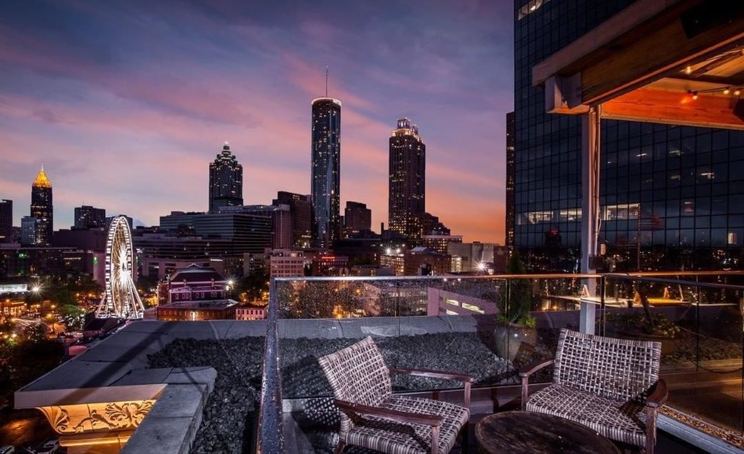 The terrace at SkyLounge Atlanta with the ATL's skyline in the background.