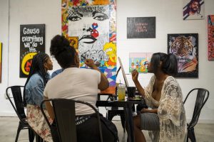 Dine & Design, a 90's themed paint and sip experience in Atlanta