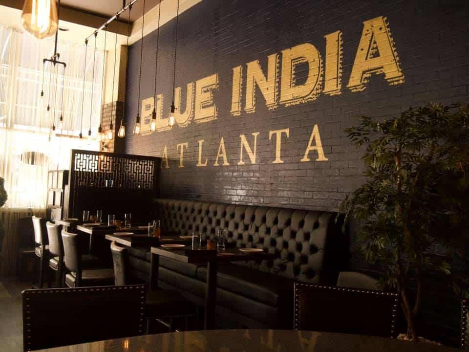 The dark dining area inside Blue India in Atlanta.