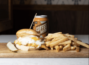 Burger, fries, and a coffee beer at Hampton + Hudson