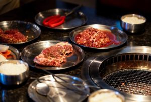 Grill and meats at the Iron Age Korean Steakhouse in Atlanta