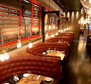 Seating booths, décor and lighting at Little Alley Steak in Atlanta