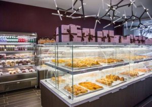 Interiors and pastry display at Sweet Hut Bakery & Café in Atlanta