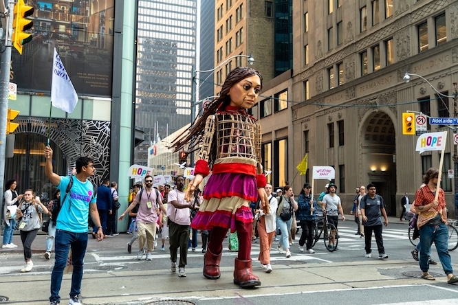 Toronto, Canada - June 07 2023: Hundreds of Indigenous people, social-justice activists and supporters welcomed 'Little Amal.' The 3.6-metre (12-foot) puppet symbolize a 10-year-old Syrian refugee